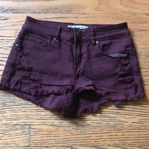 Maroon distressed jean shorts